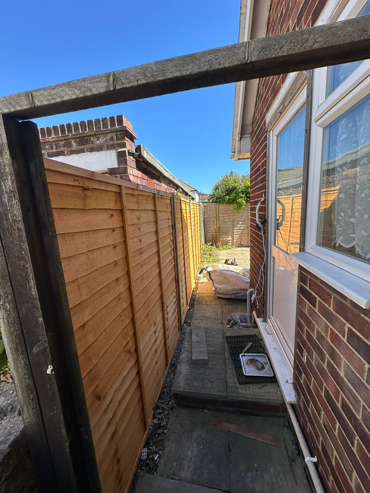 Brand new feather-edge fence installed by EHW Landscapes
